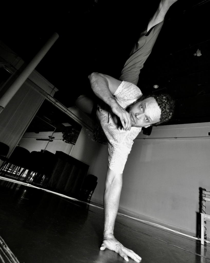 Junior Domingos doing a handstand